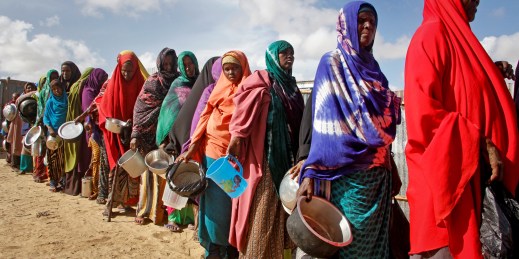 Women who fled drought line up to receive food.
