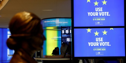 Video screens at the European Parliament building promote the upcoming European elections.