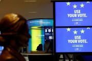 Video screens at the European Parliament building promote the upcoming European elections.