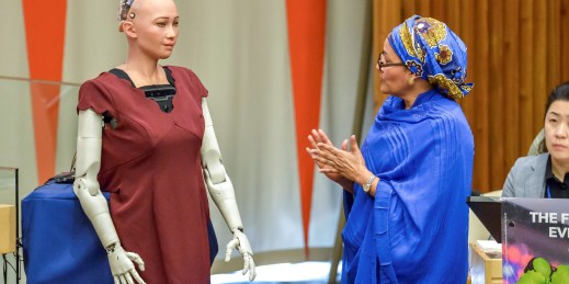 U.N. Deputy Secretary-General Amina J. Mohammed interacts with the robot Sophie.