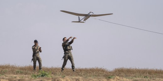 Israeli soldiers launch a drone.