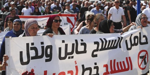 Arab Israelis march in a demonstration calling for an end to the war in Gaza.