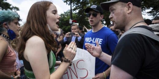 An abortion rights advocate argues with an anti-abortion demonstrator.