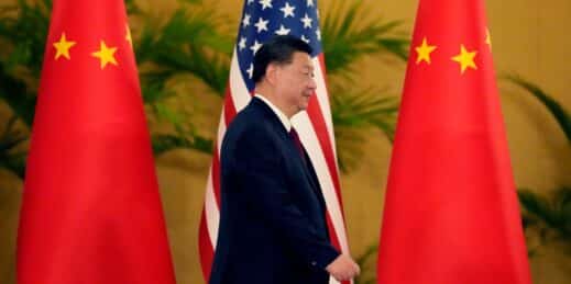 Chinese President Xi Jinping walks to greet U.S. President Joe Biden.