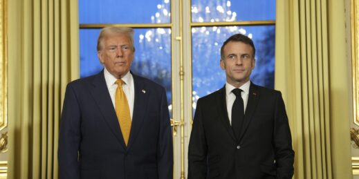 French President Emmanuel Macron poses with U.S. President-elect Donald Trump.
