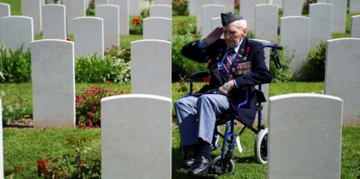A veteran pays tribute at the Bayeux War Cemetery ahead of a service of commemoration for the 80th anniversary of D-Day.