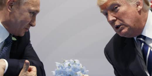 Former U.S. President Donald Trump, right, meets with Russian President Vladimir Putin.