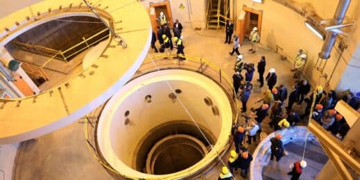 Technicians work at the Arak heavy water reactor’s secondary circuit in Iran.
