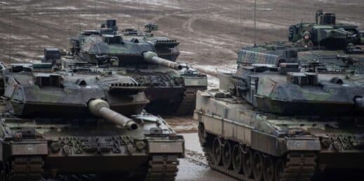 Three Leopard 2A6 main battle tanks
